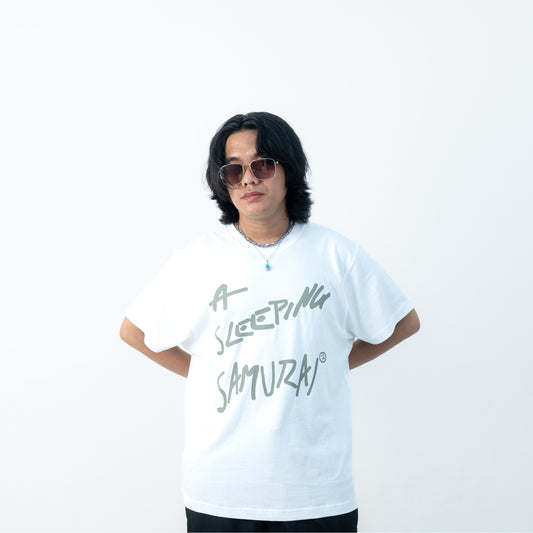 Model wearing white graffiti message short-sleeve organic cotton t-shirt