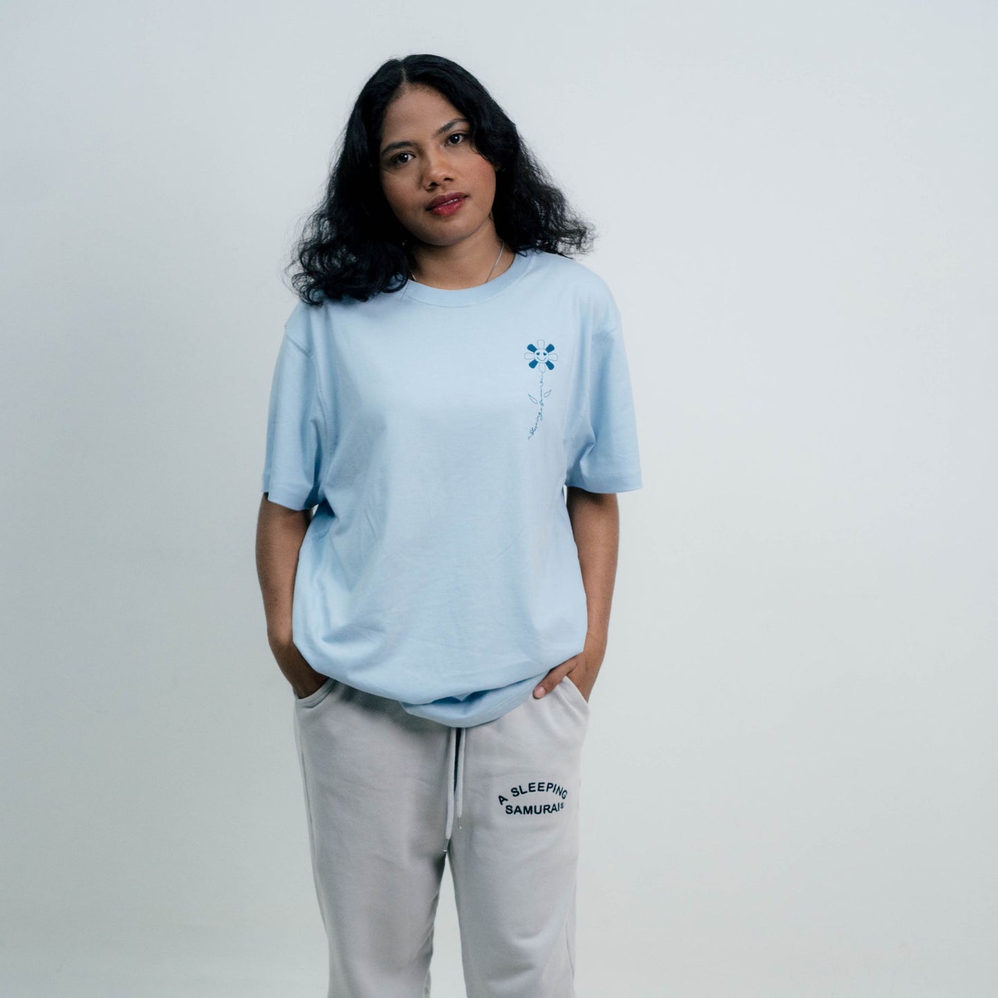 Model Wearing A Sleeping Samurai Happy Flowers Light Blue T-Shirt Front