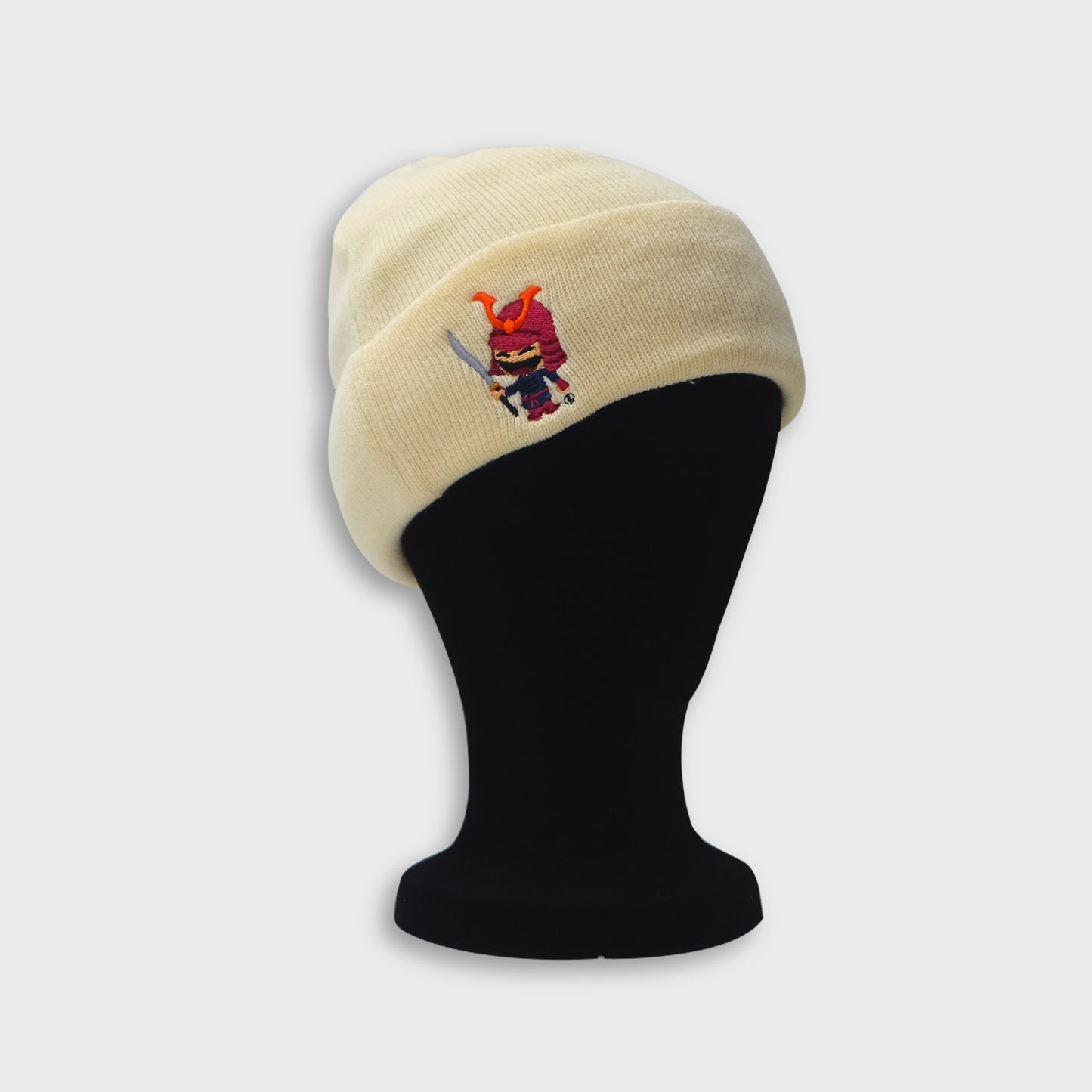 A Sleeping Samurai New Era Yellow Beanie on dummy front view