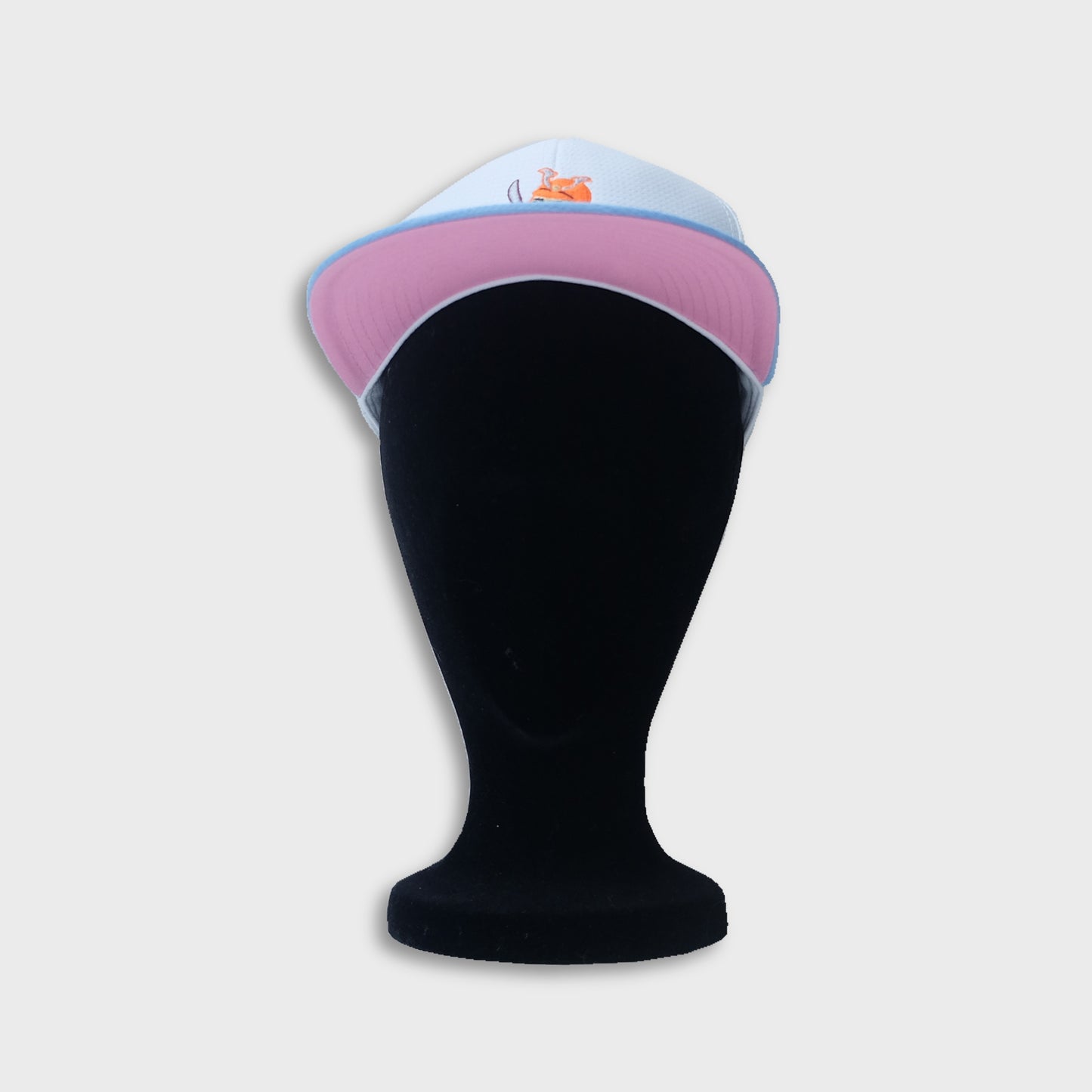 A Sleeping Samurai Sakura baseball cap in white, pale blue, and pink on dummy tilted view