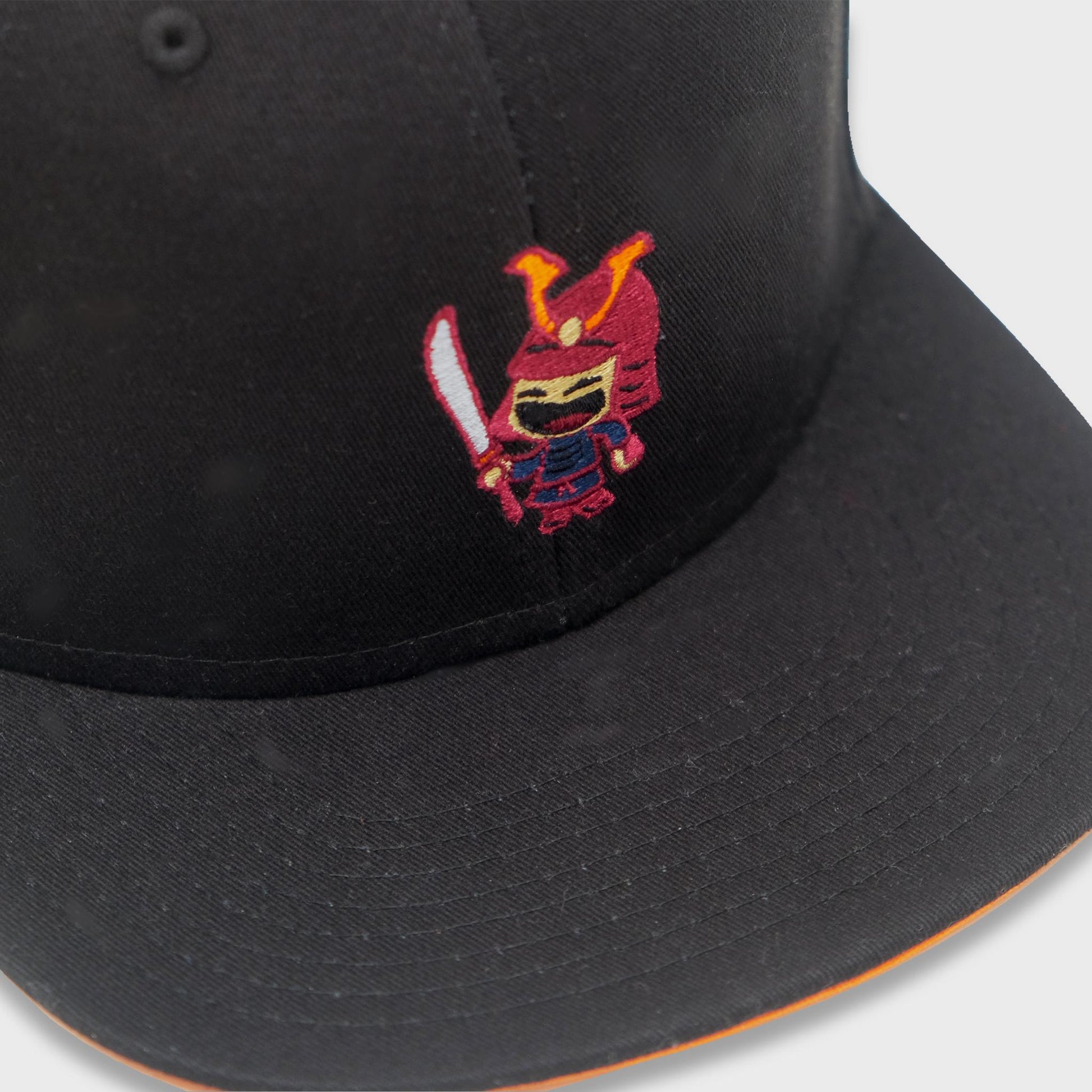 A Sleeping Samurai Carbon baseball cap in black. front closeup