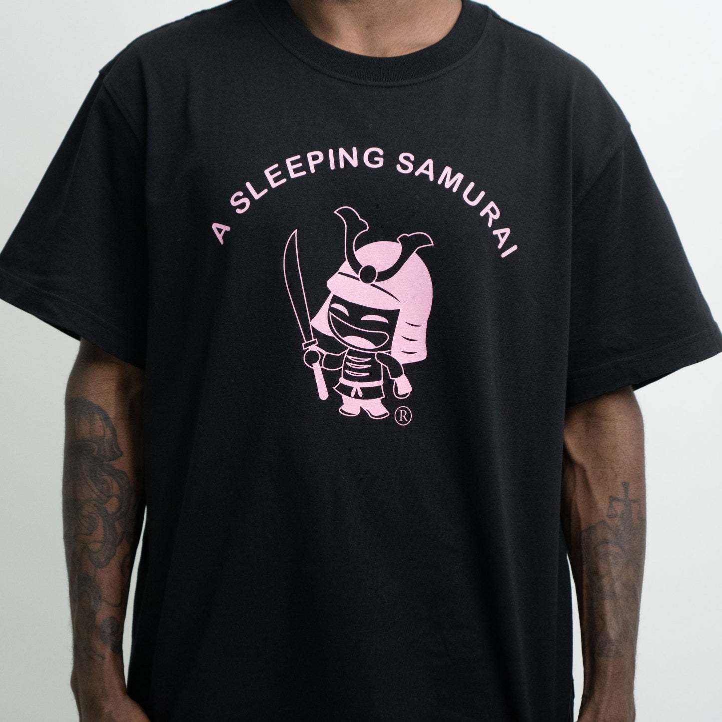 Model wearing Black organic cotton T-Shirt closeup